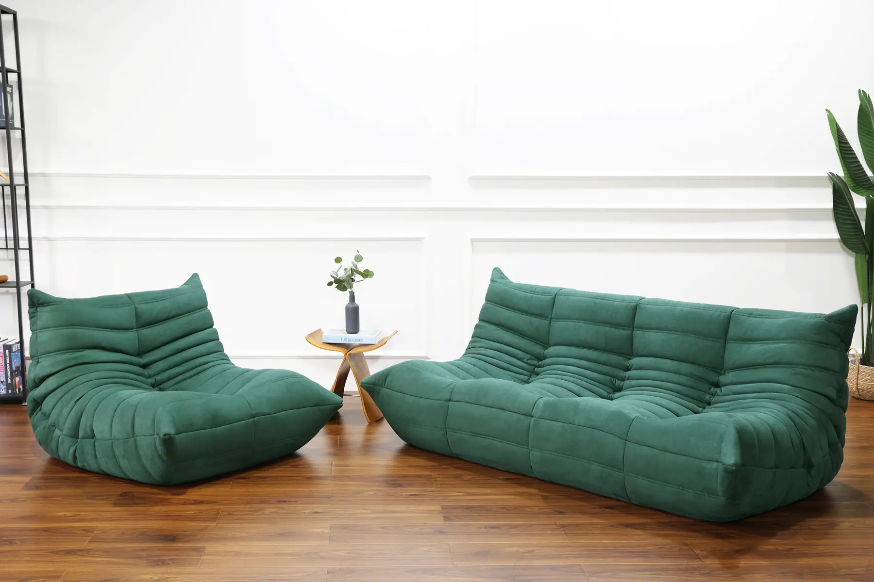 a green togo couches in a room